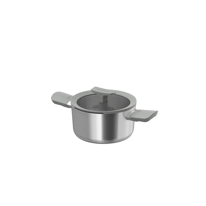 Stainless steel casserole with a lid and two handles, 18 cm in diameter, sleek design.